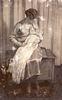 Florence Piper with baby Flopsie in her Christening dress